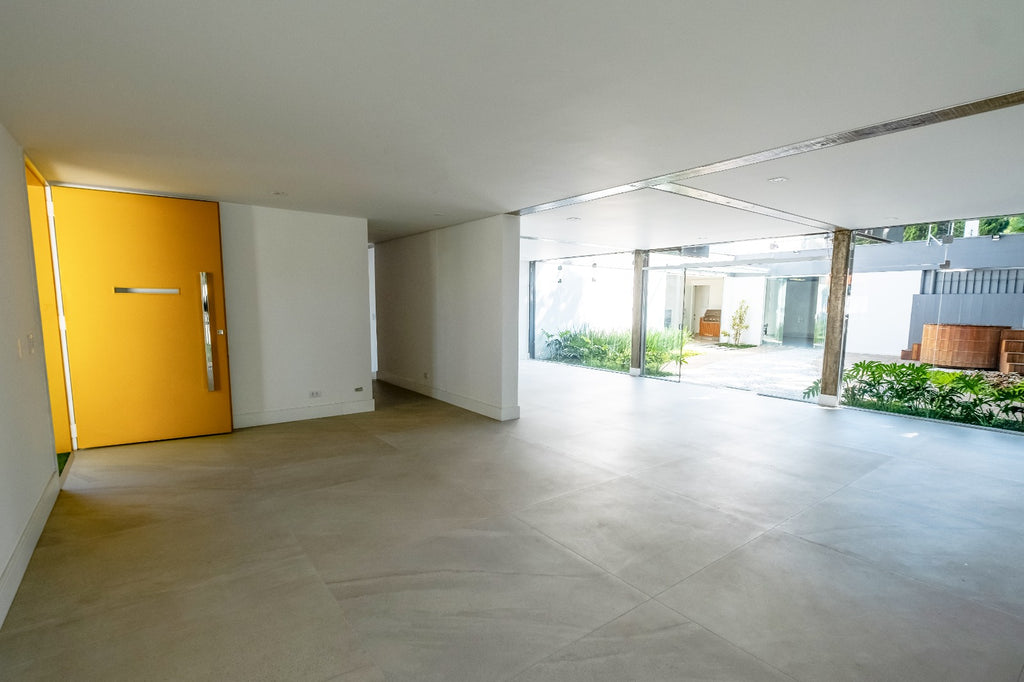Casa Alto Padrão no Jardim Paulista: 310m² Construídos, Terreno 497m², Arquitetura Icônica e Retrofit Exclusivo